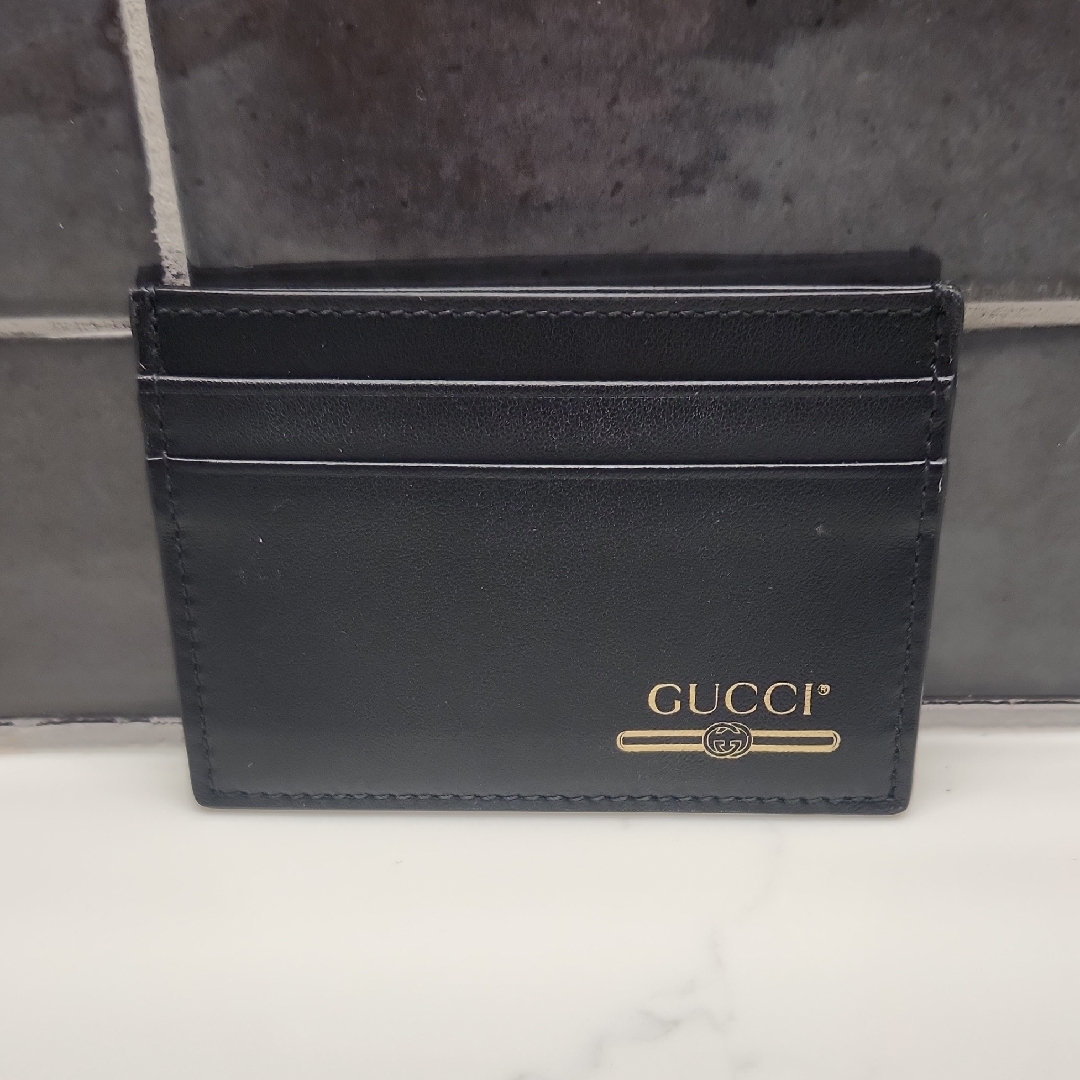 Gucci Gold And Black Leather Card Holder